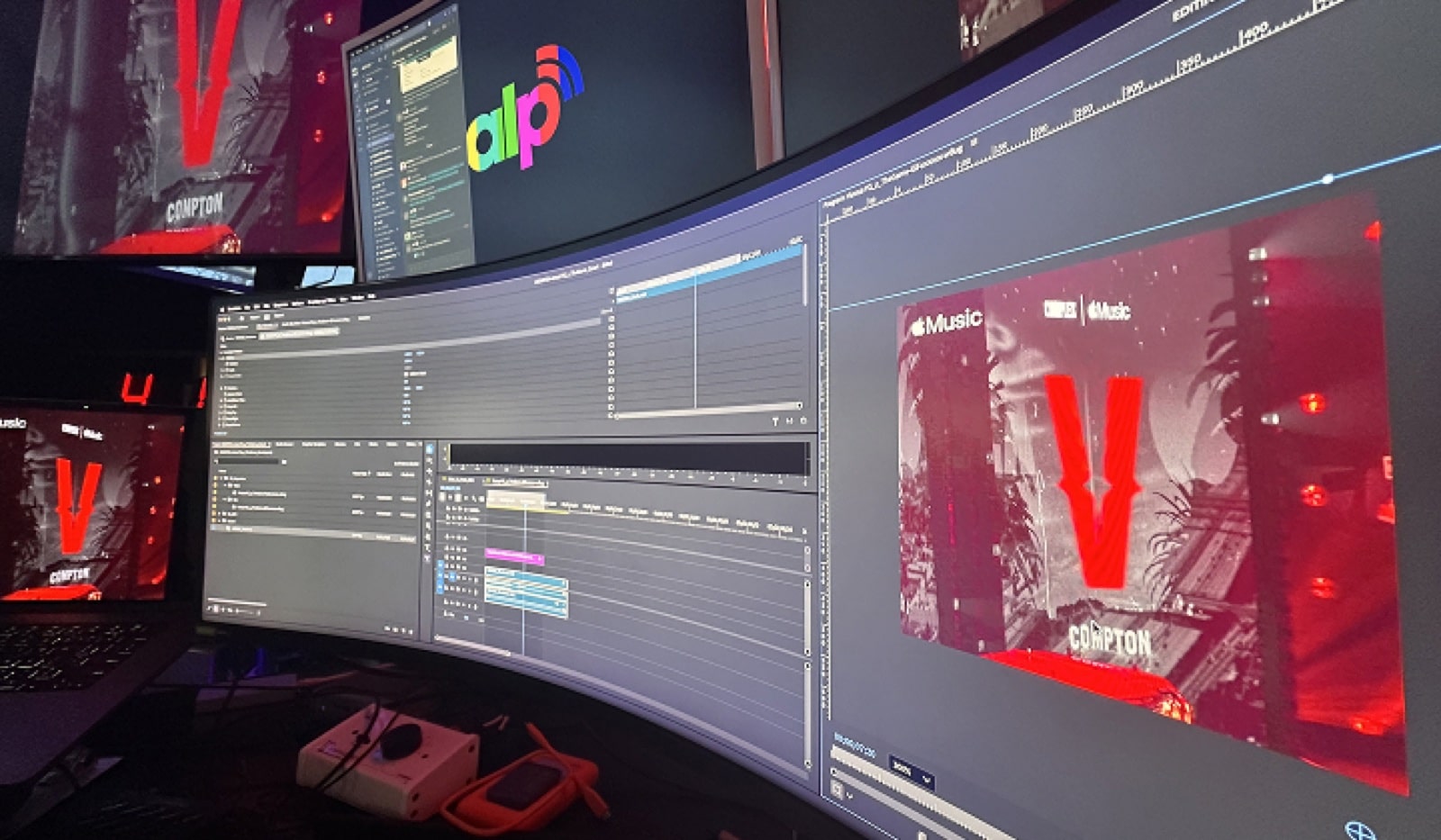 Post-production editing suite with curved monitors
